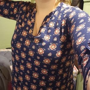 Blue blouse with red flower design